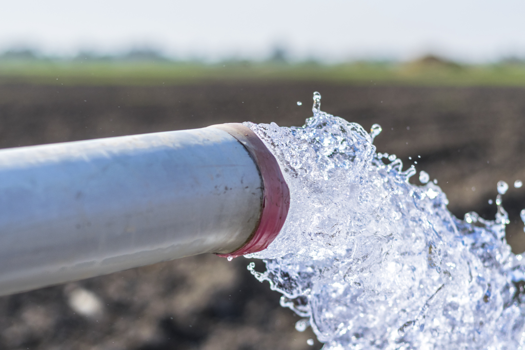 An image depicting a hand well pump.